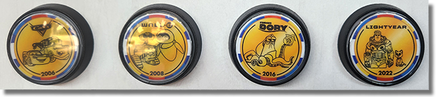 #140-143 Button Set, Pixar Fest Themed Medallions #140 Cars 2006, #141 Wall-E 2008, #142 Dory 2016, #143 Lightyear 2022, Medallion Guide #s 140-143. Tomorrowland April 26, 2024.